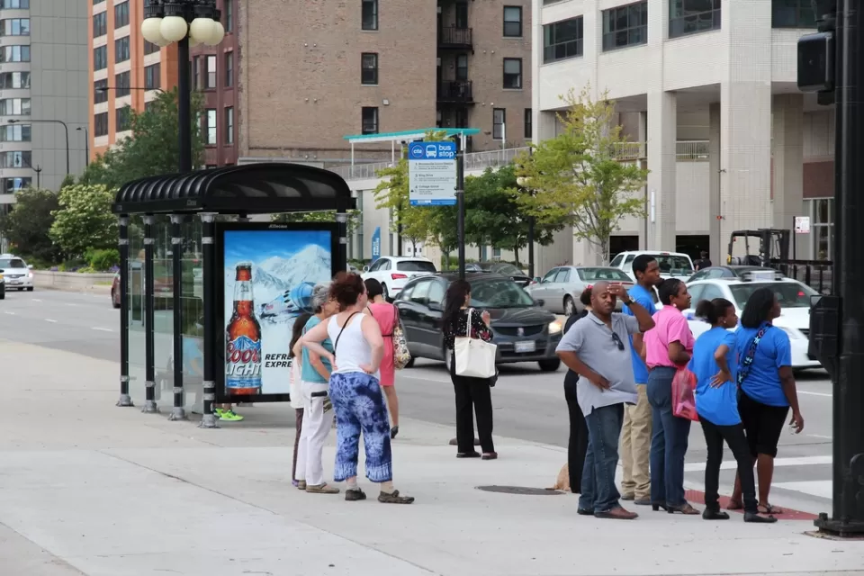 People waiting at a Chicago bus stop